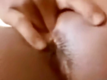 Cute Black teen fingers herself close-up in English blear